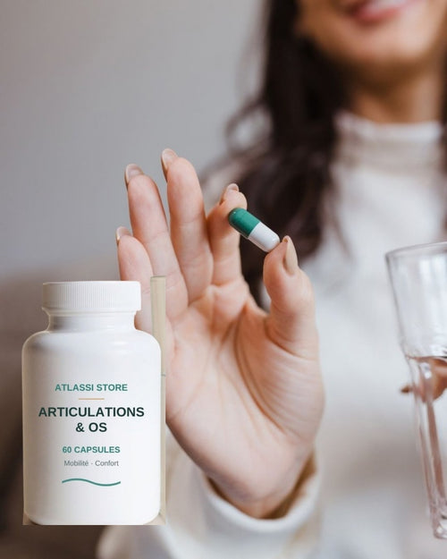 Femme prenant sa capsule Articulations & Os Atlassi Store